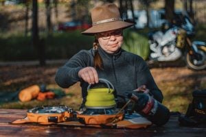 Amanda Zito cooking at camp