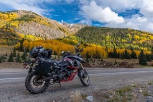 An adventure bike is the perfect tool to explore the Million Dollar Highway and the scenery around it. The fall scenery in the area is beautiful, as you can see here, but beware! Slow-driving tourists can clog up the roads if you wait until a September weekend to visit. Photo: Zachj6497/Shutterstock.com